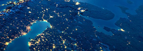 Finland from space, the lights of big cities can be seen in the darkness of the night.