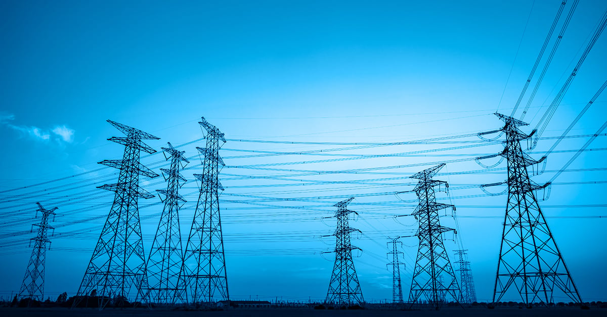 Power grid power towers on a blue background.