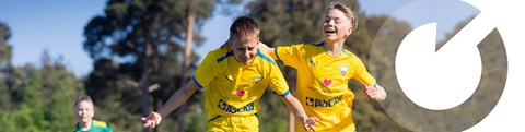 Young people's joy at scoring a goal.