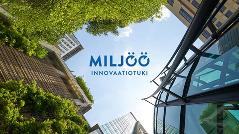 Miljöö-innovaatiotuki logo. Kuvassa kaupunki kuvattuna sammakkoperspektiivistä.